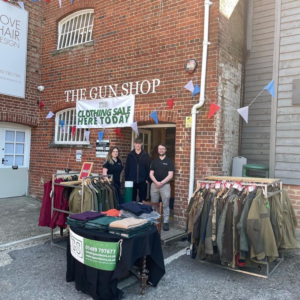 The TGS Outdoors team outside the shop on sales day